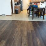 Den with new flooring (facing Kitchen)